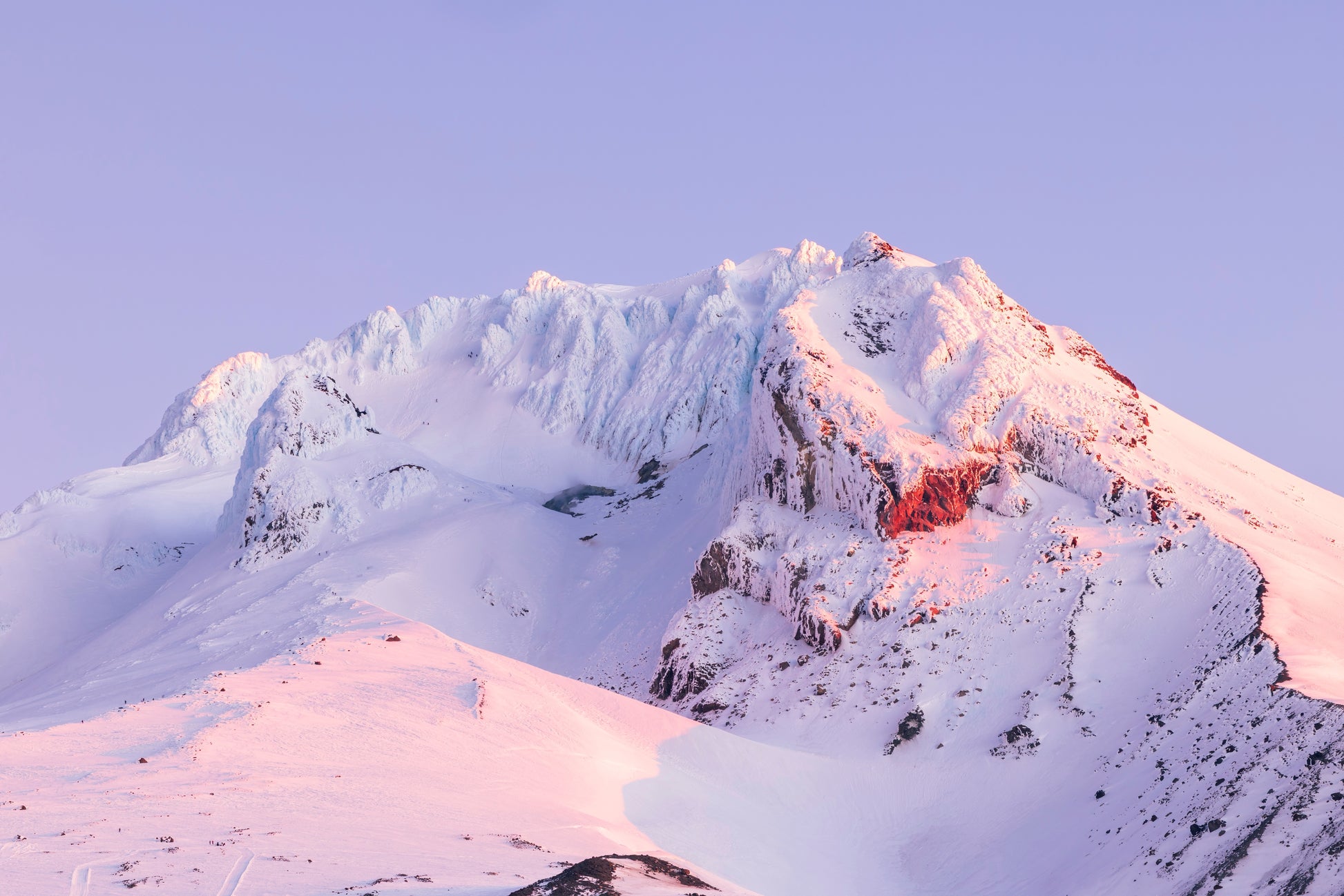 Mount Hood at sunset with golden light on snow-covered peak 