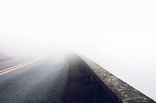 Rowena Crest curves on Oregon's Historic Columbia River Highway during a fog inversion, with serpentine road winding through thick blanket of clouds in the Columbia River Gorge - fine art landscape photography print